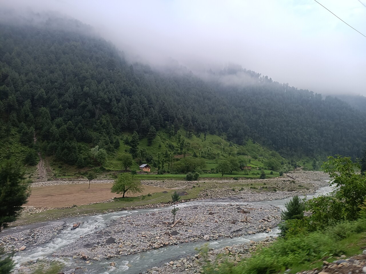 Snow-capped mountain ranges viewed from Sinthan Top summit