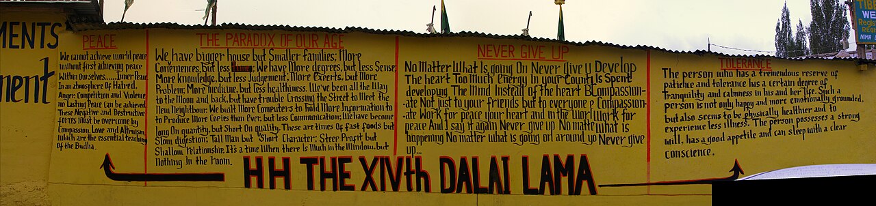 Official checkpoint signpost on a remote mountain road in Ladakh