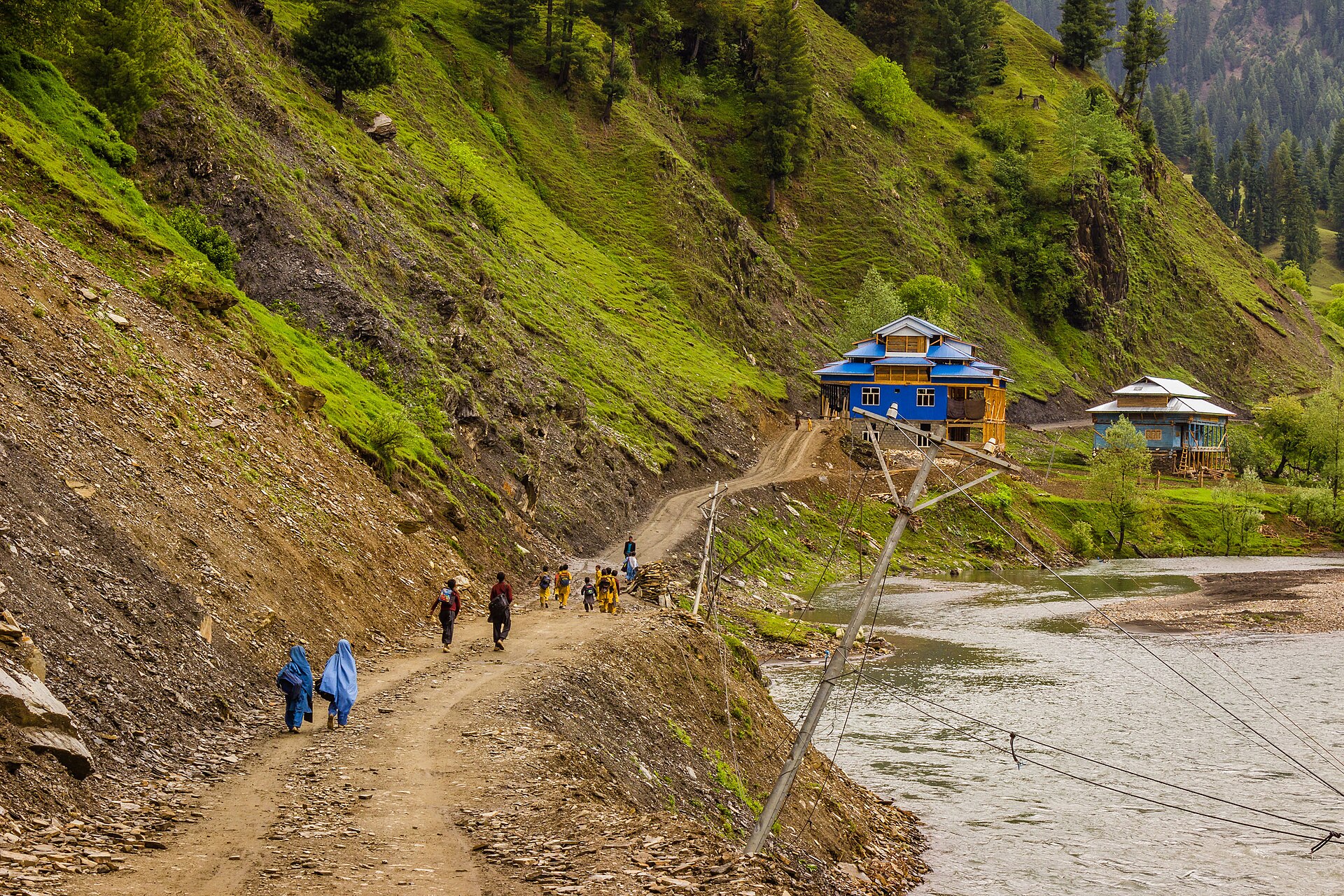 A winding, narrow road through the mountains