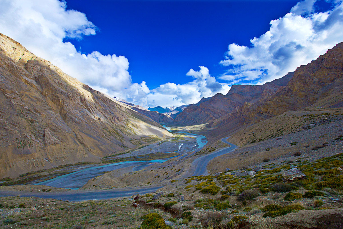 Paved highway winding through the arid mountain landscape of Ladakh