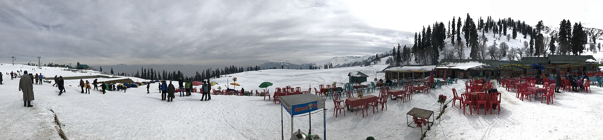 Winding mountain road cleared of snow in Kashmir