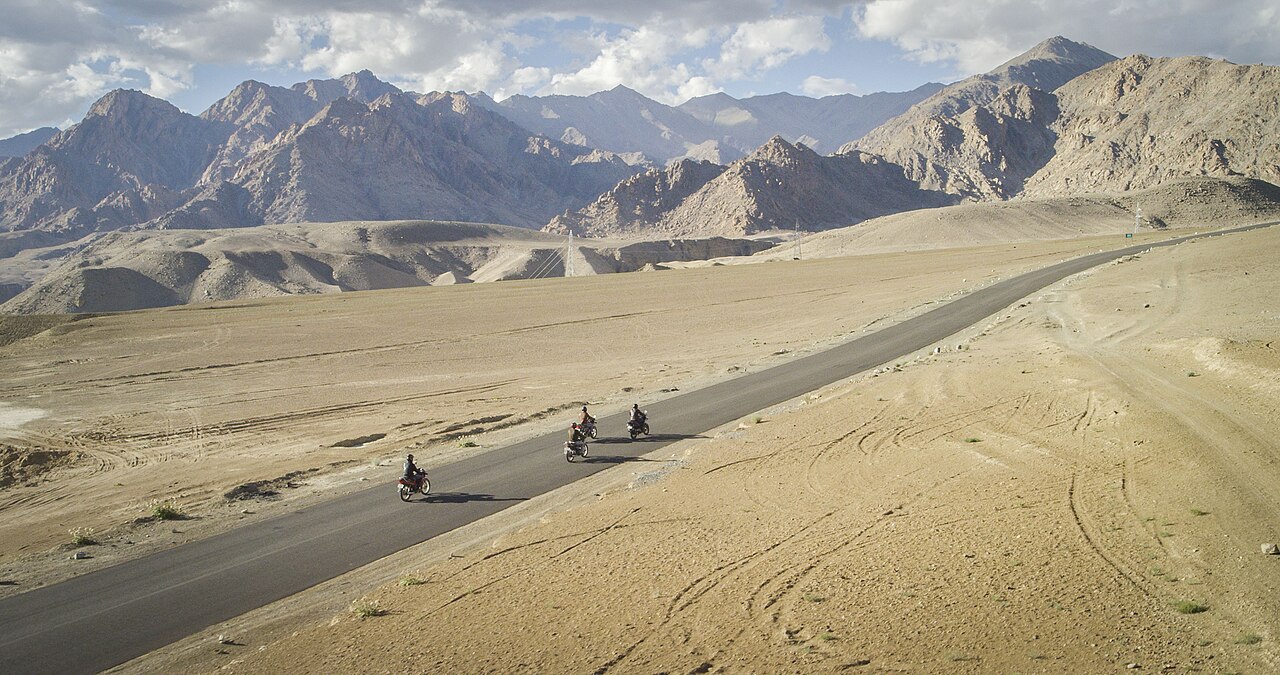 A vehicle on a winding mountain road