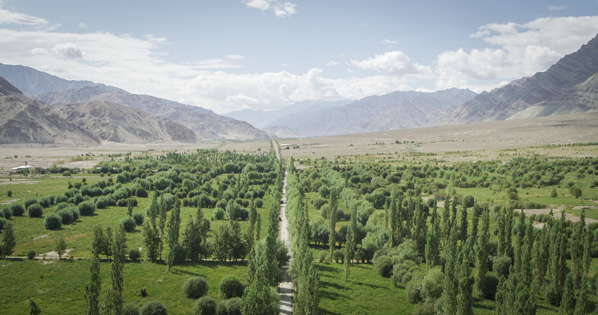 Aerial view of Kashmir valley and surrounding mountain ranges