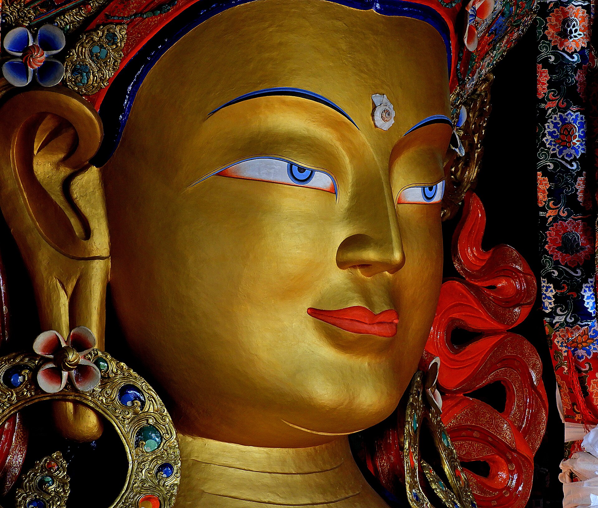Large gilded Maitreya Buddha statue inside Thiksey Monastery