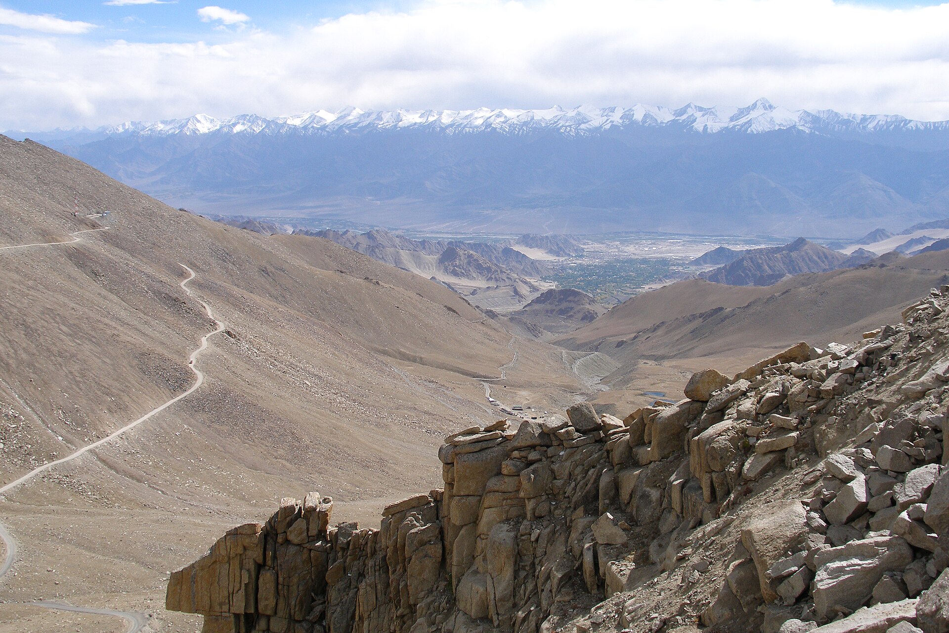 Winding mountain road leading up to Khardung La pass in Ladakh