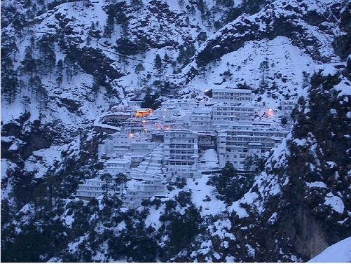 Pilgrims walking on the illuminated path to Vaishno Devi at night