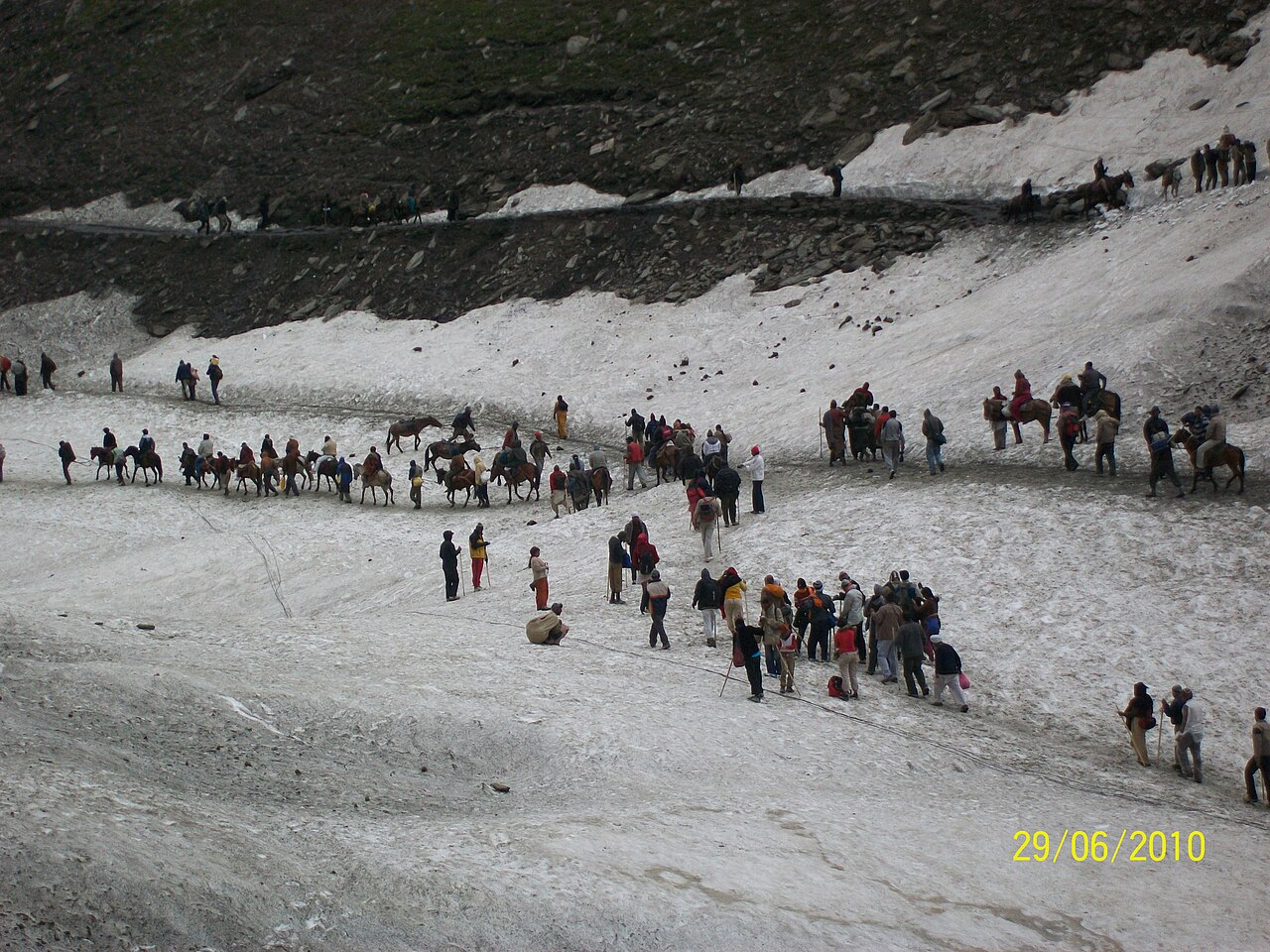 Group of pilgrims on the trek to the cave