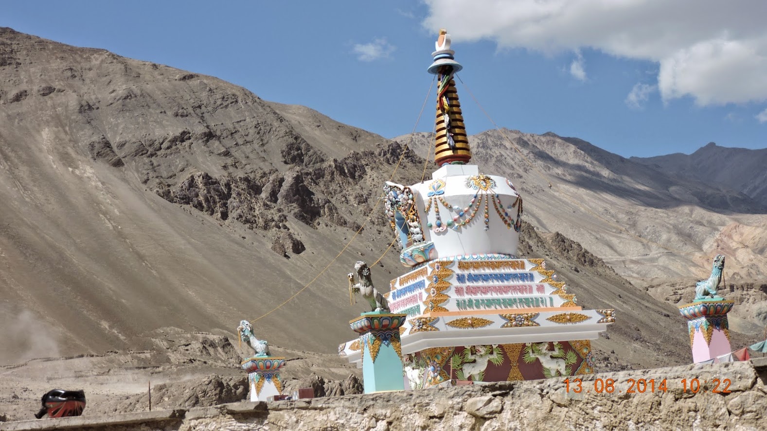 Winding mountain road cutting through barren hills in Ladakh
