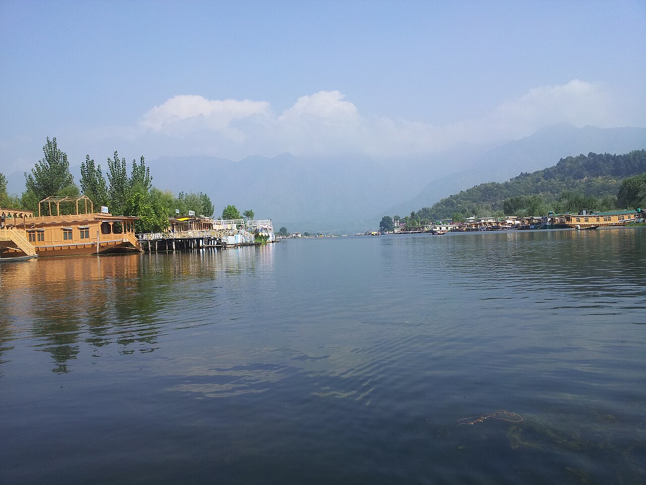 Carved walnut wood interior of a traditional houseboat in Srinagar