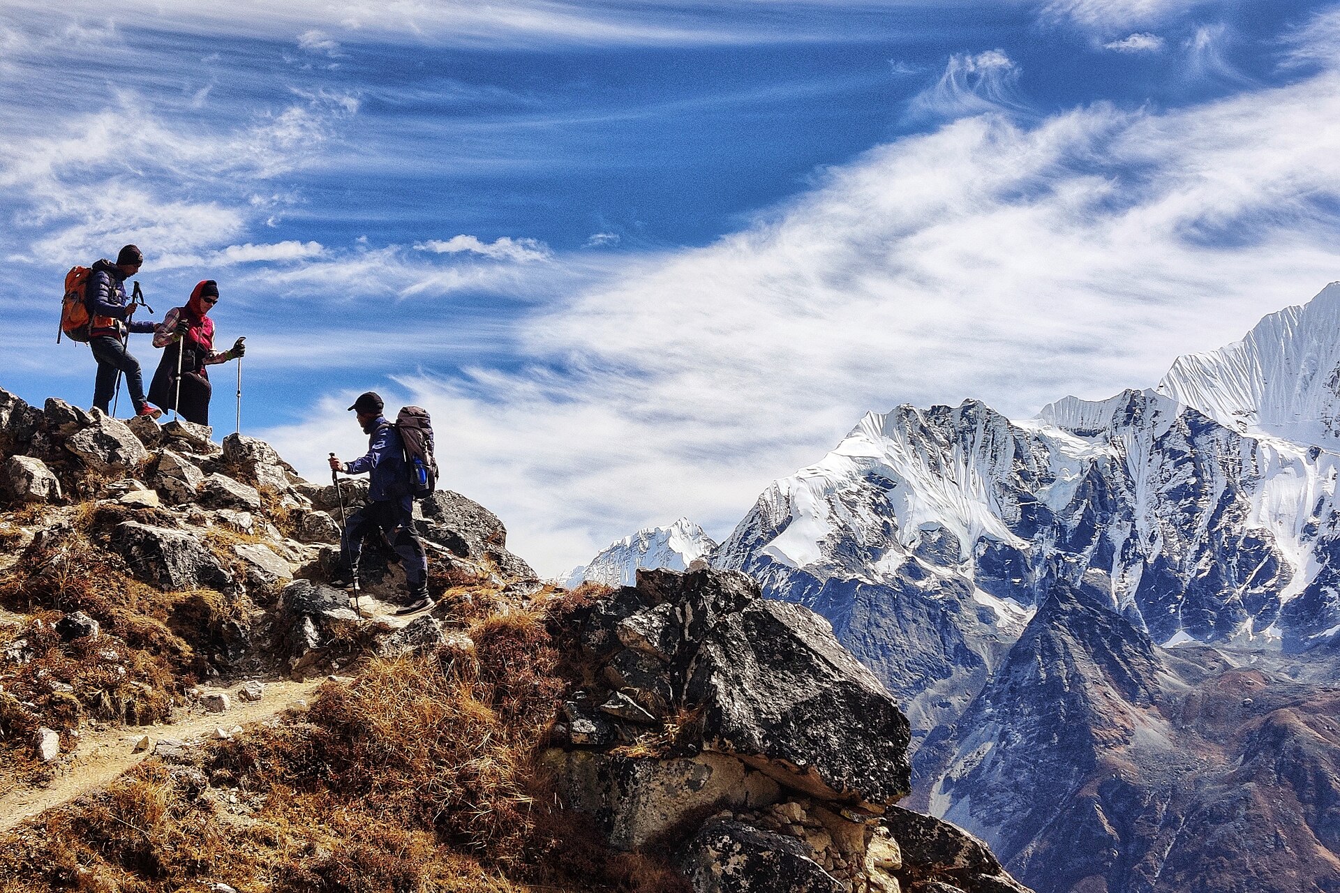 Pilgrim tents set up along a high-altitude mountain trail during the summer months
