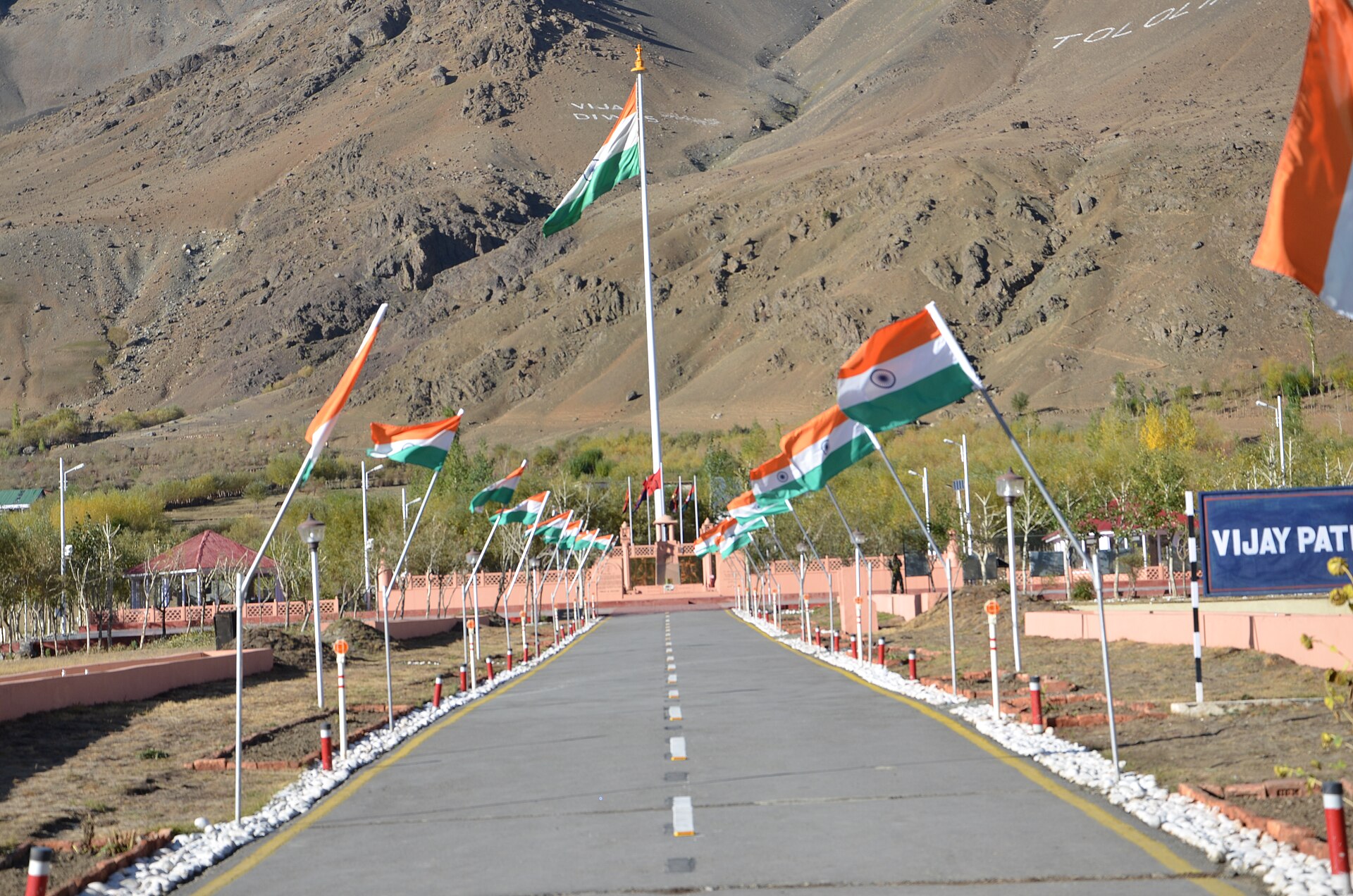 A view of the stone memorial and the surrounding mountains in Dras.
