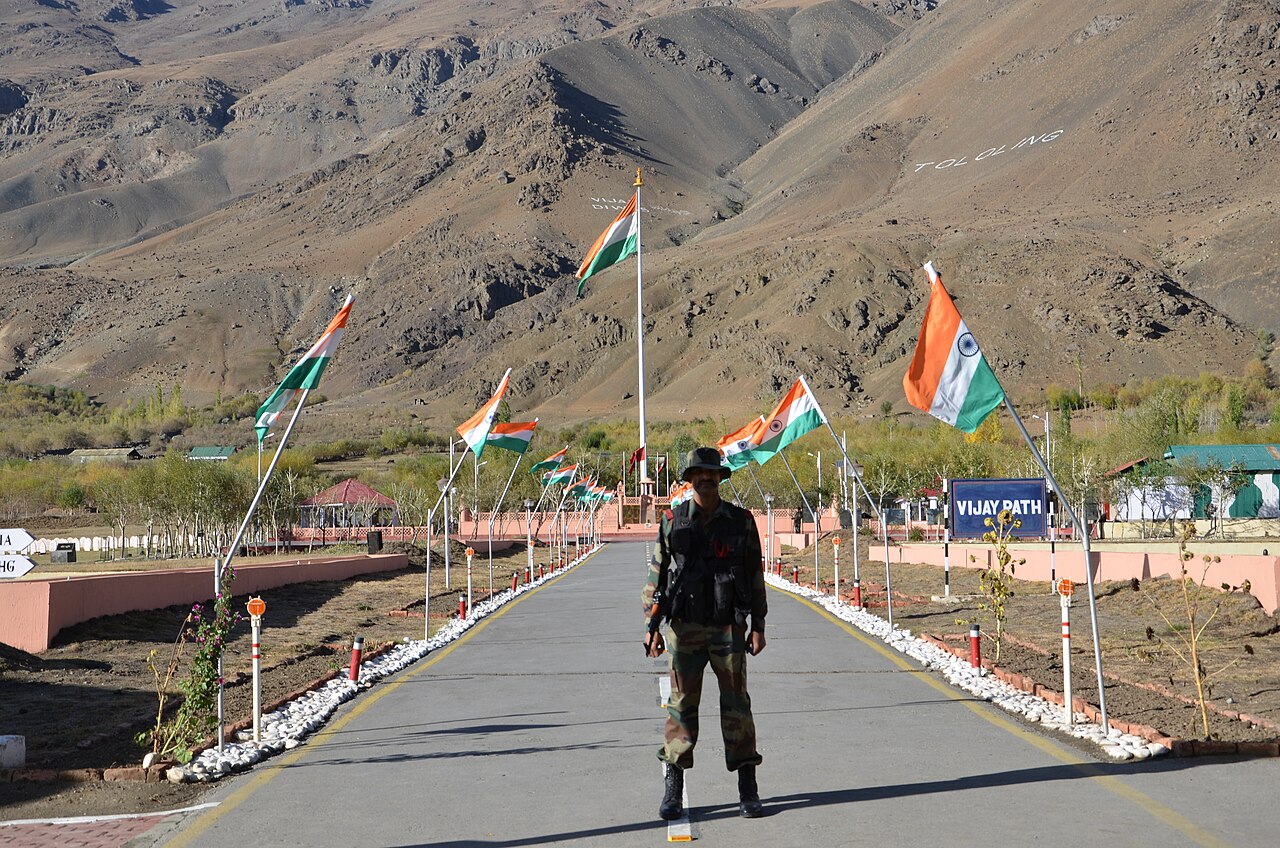 Flags flying at the memorial entrance.