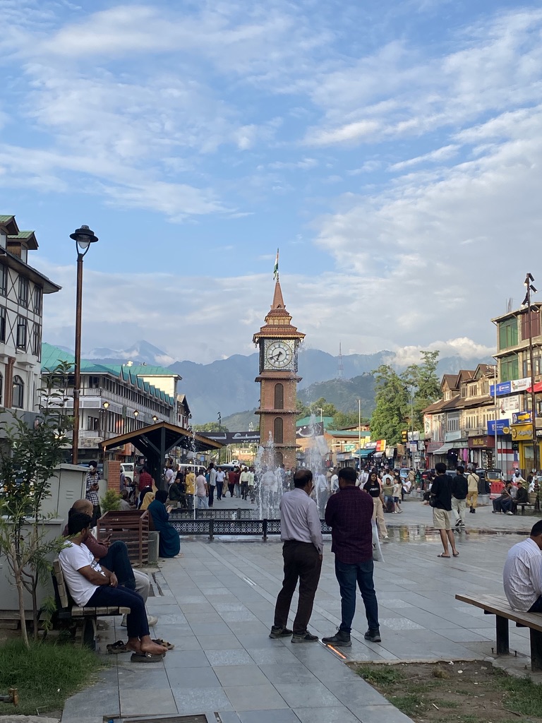 Lal Chowk clock tower in Srinagar with pedestrians