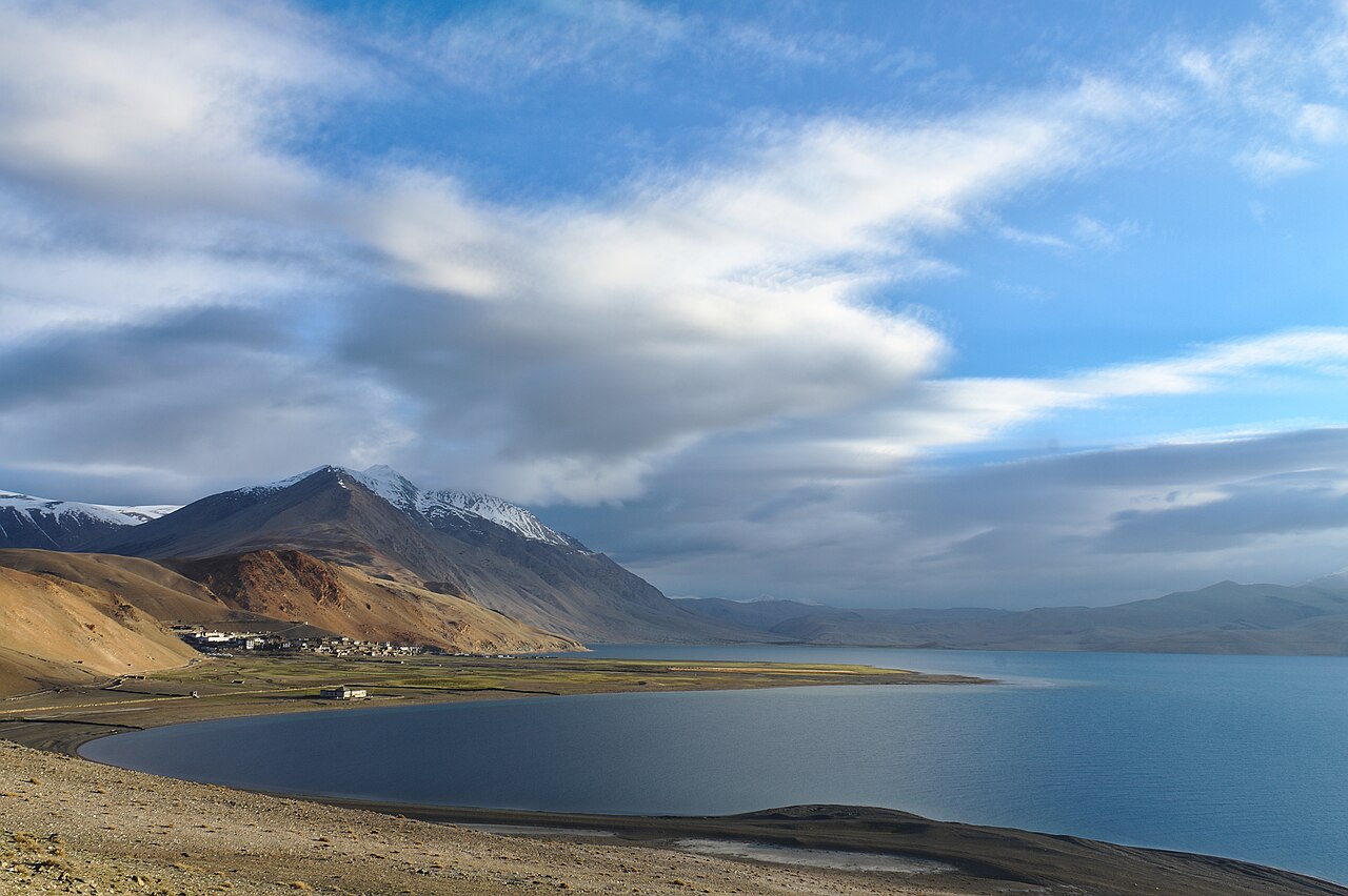 Tourists gathered at a popular photo spot by Pangong lake