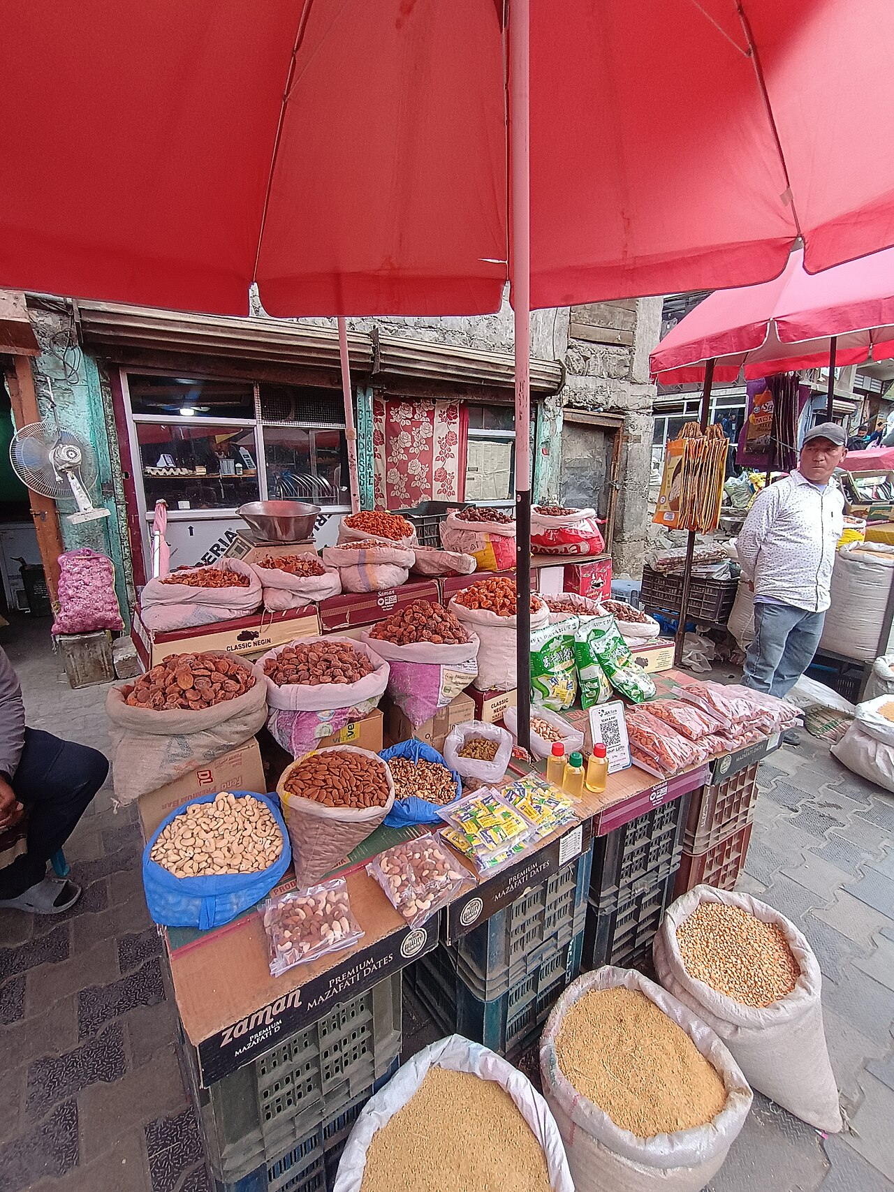 Vendors selling dry fruits in the Kargil market.