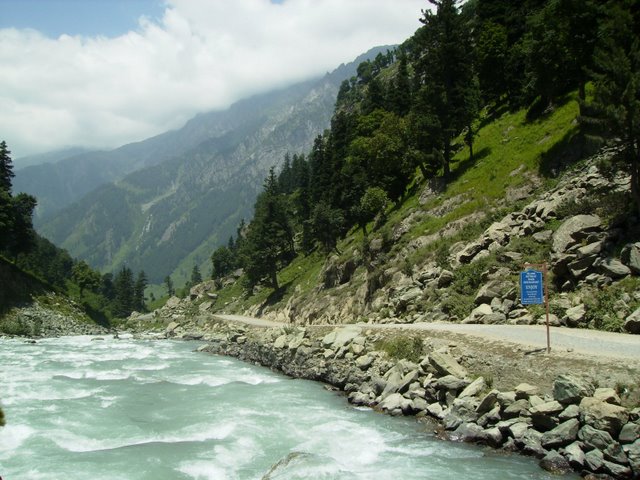 Winding river through the wide valley floor of Sonmarg