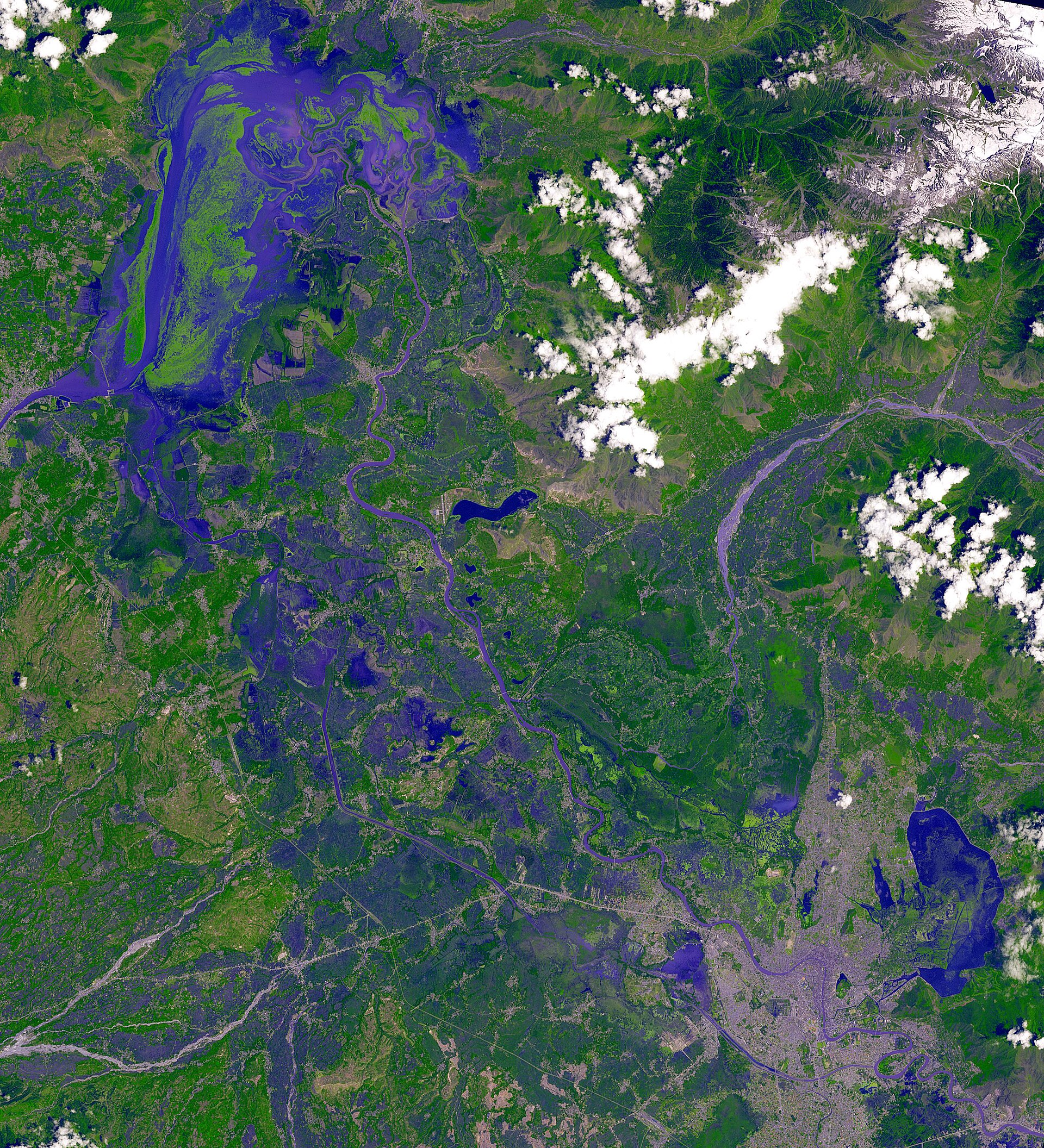 The Jhelum river entering the expansive waters of Wular